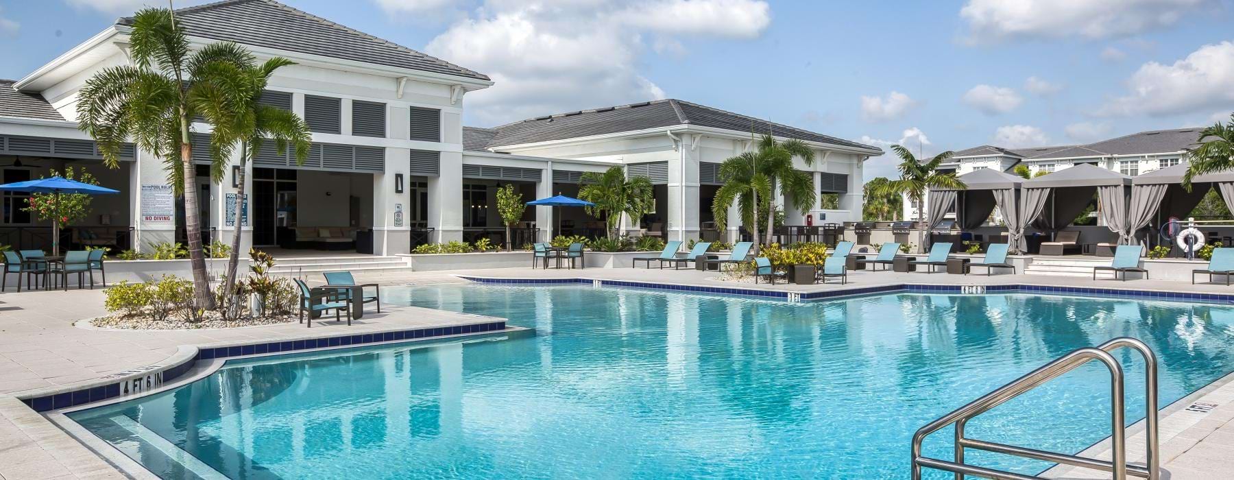 a swimming pool in front of a building