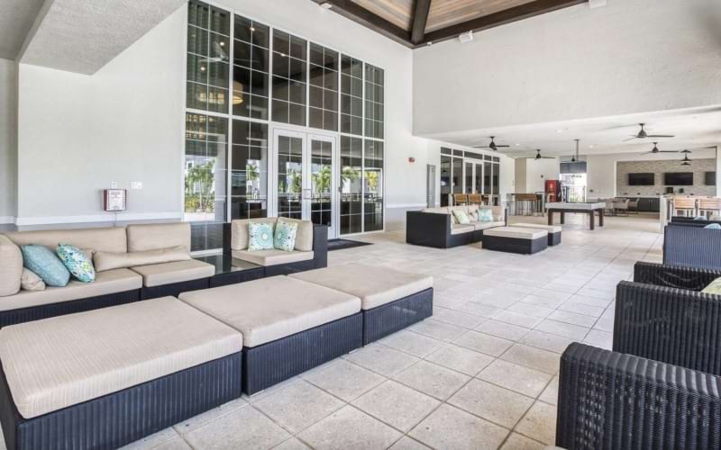 a clubroom with couches and chairs